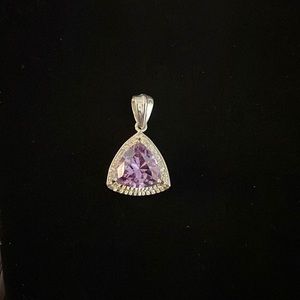 Silver pendant with purple stone